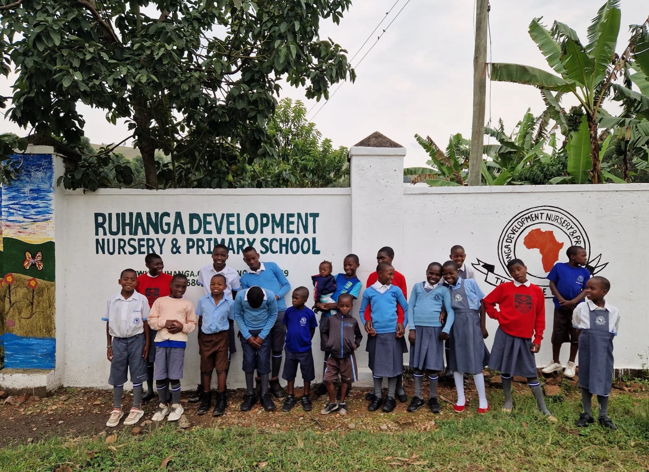 Group of pupils at the school Tutoring Heroes supports in Uganda