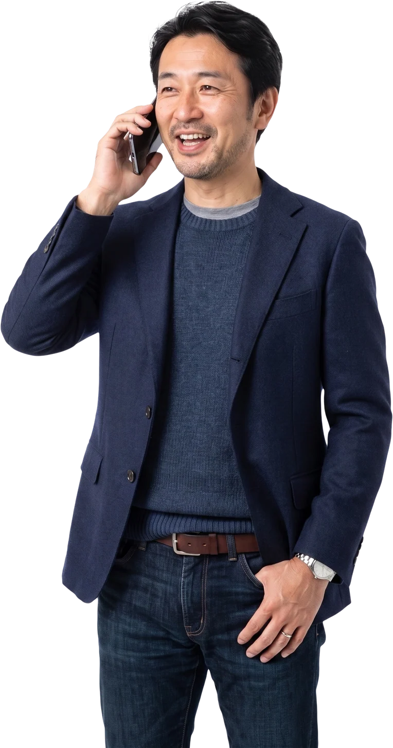 Smiling businessman talking on his mobile phone
