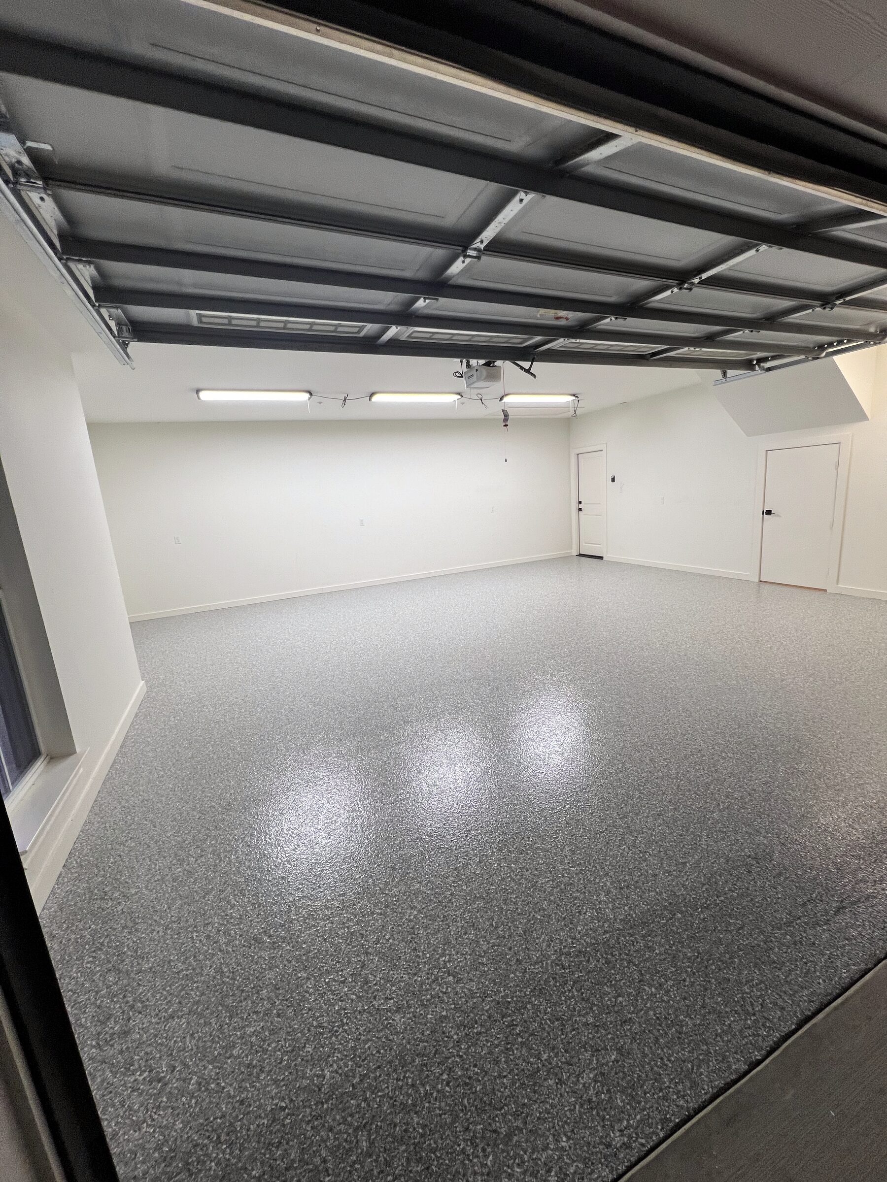 Two-car garage, grey and white flake