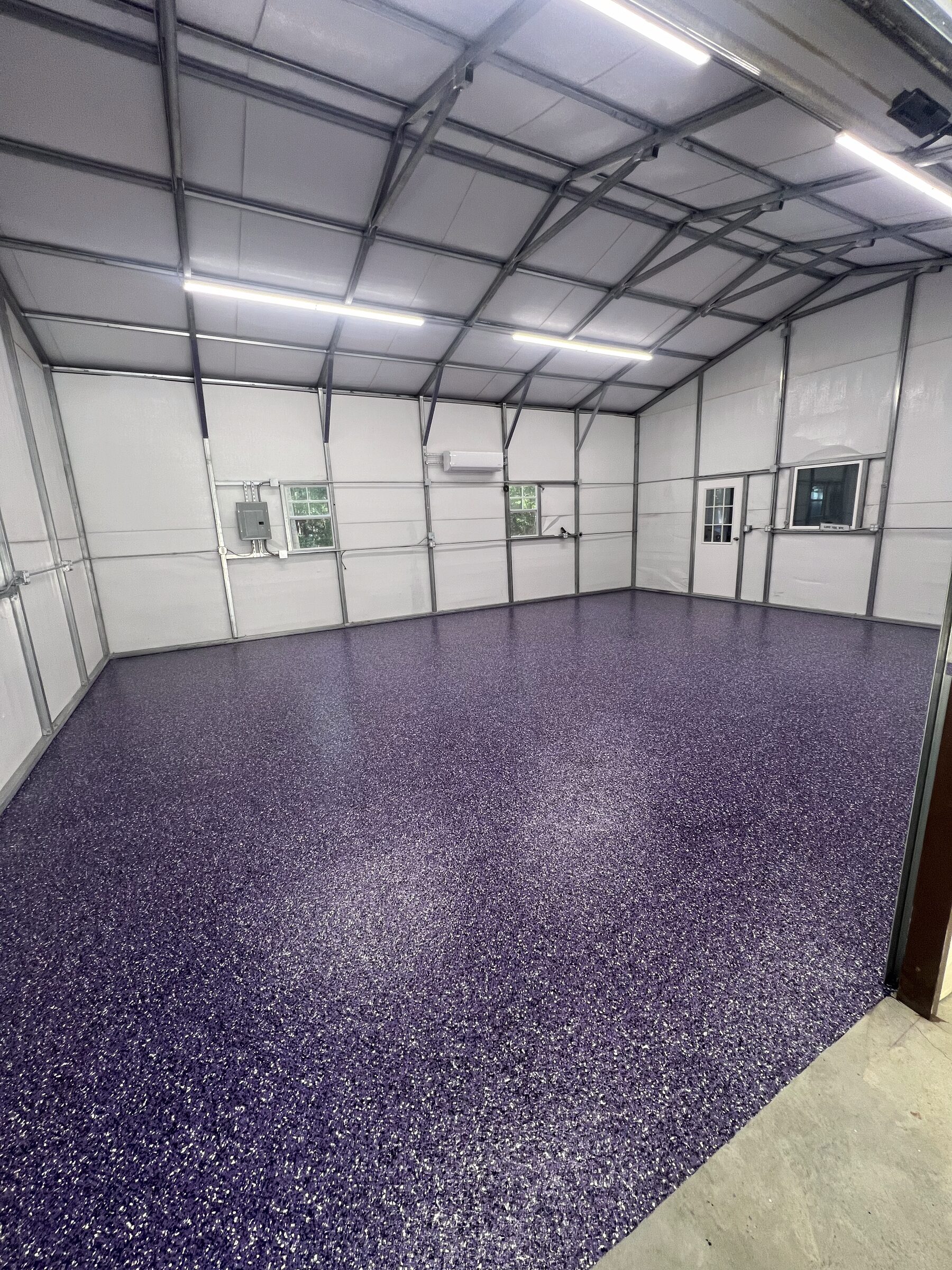 Metal shop building, purple flake