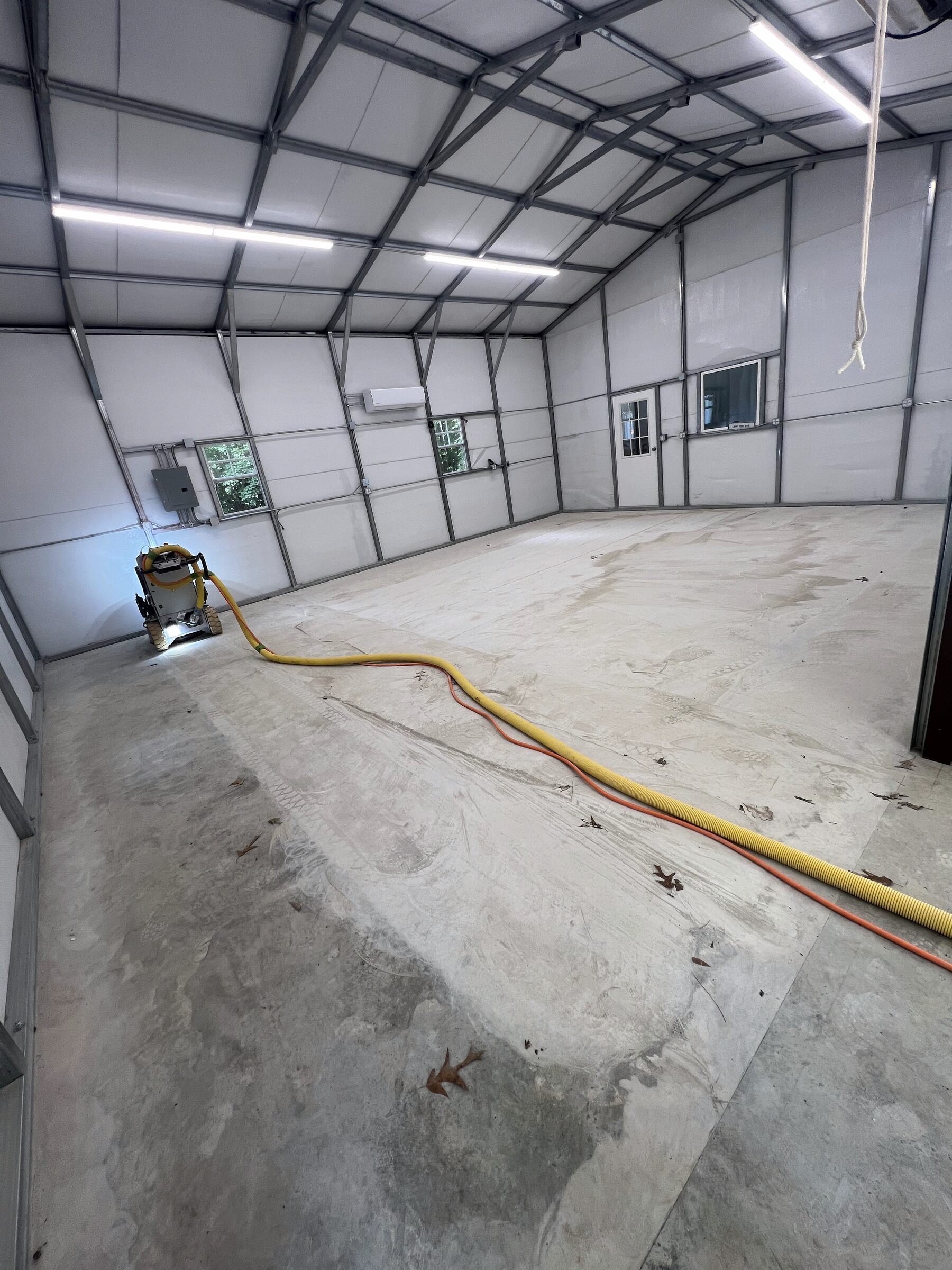 The concrete slab before we prepped and coated it