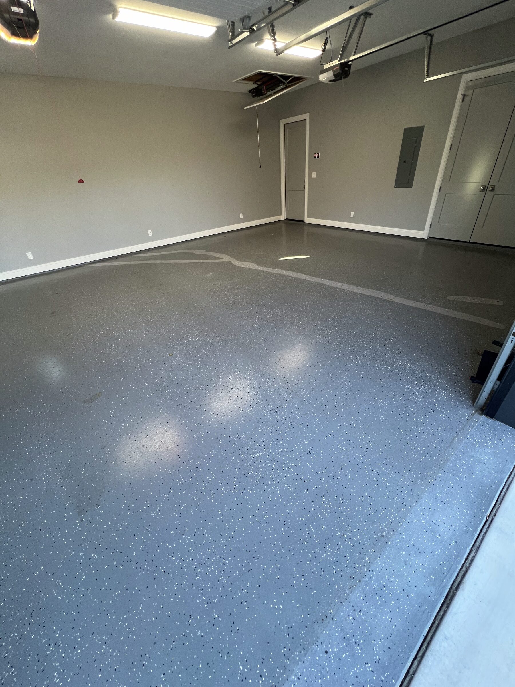 The concrete slab before we prepped and coated it