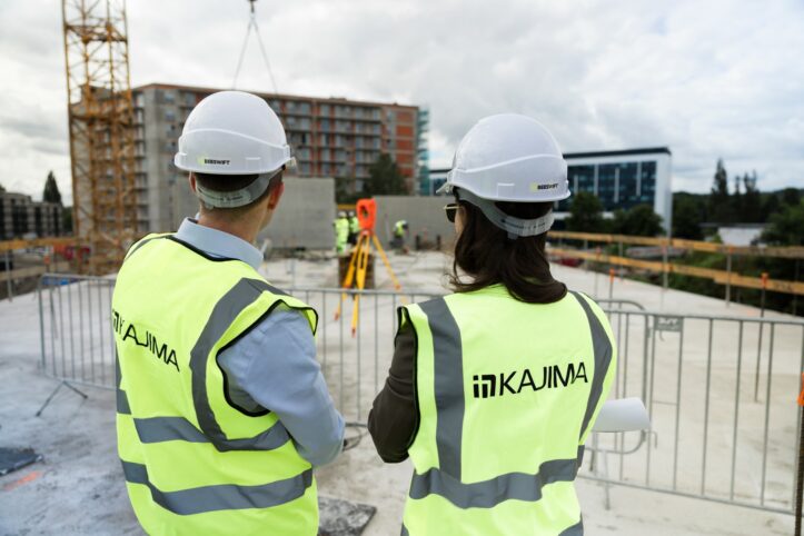 Kajima colleagues overlooking a construction site