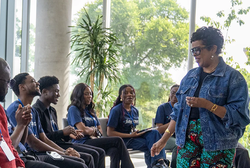 Students in conversation with a mentor