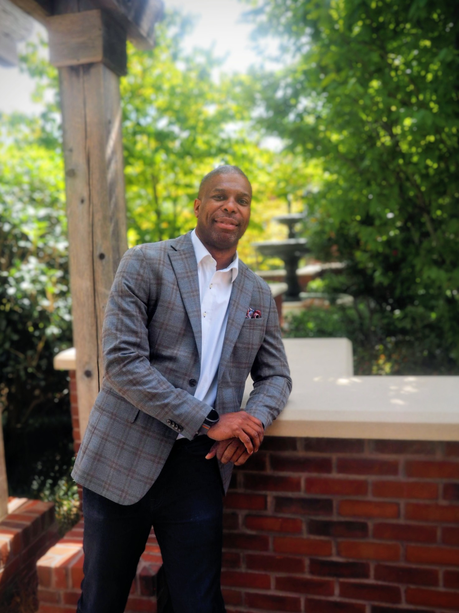 Dr. Christopher Green outdoors in a grey jacket