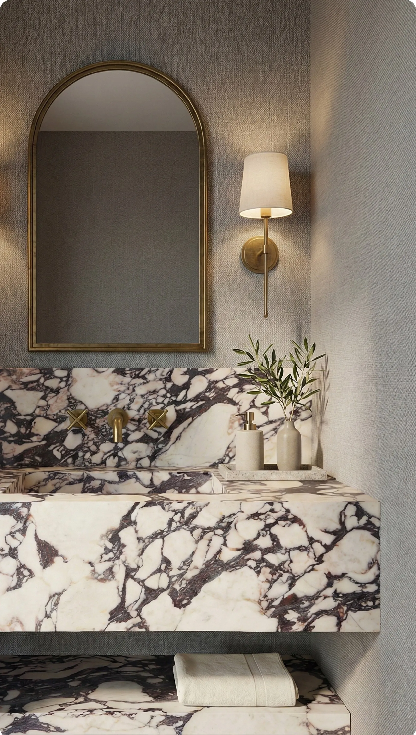 Powder room in Calacatta Viola marble with brass fittings