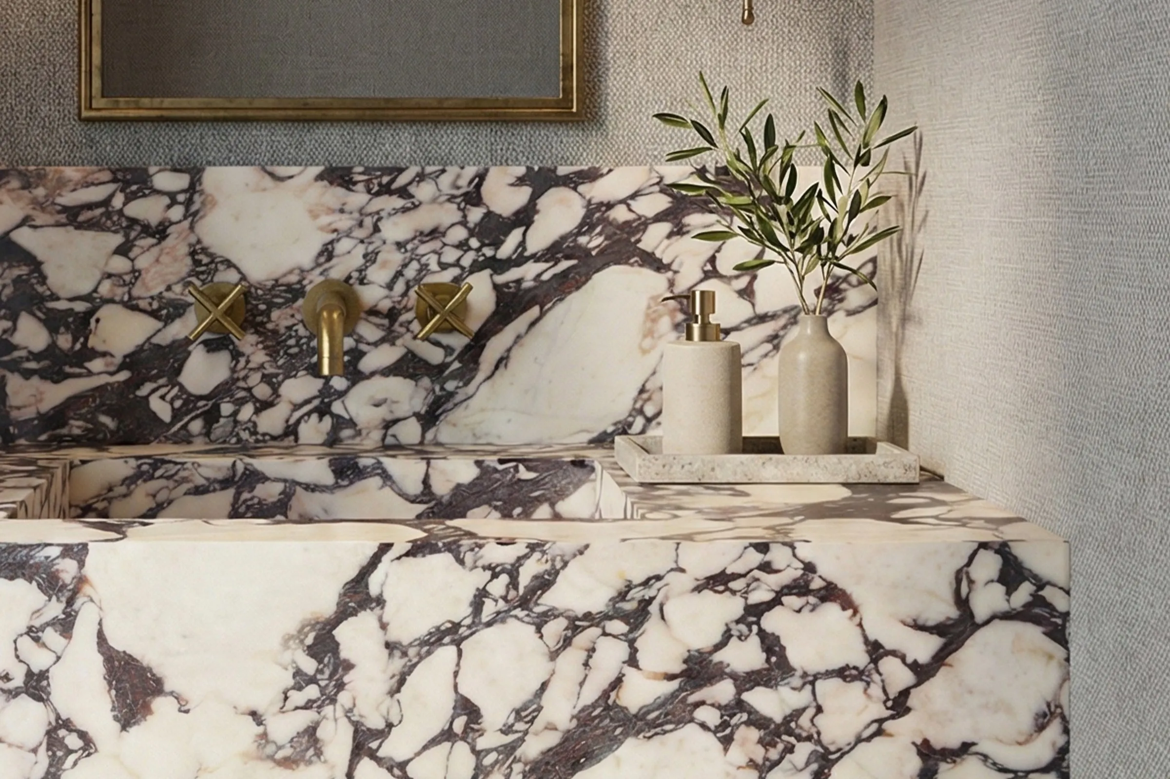 Design study: powder room with expressive marble and brass fittings