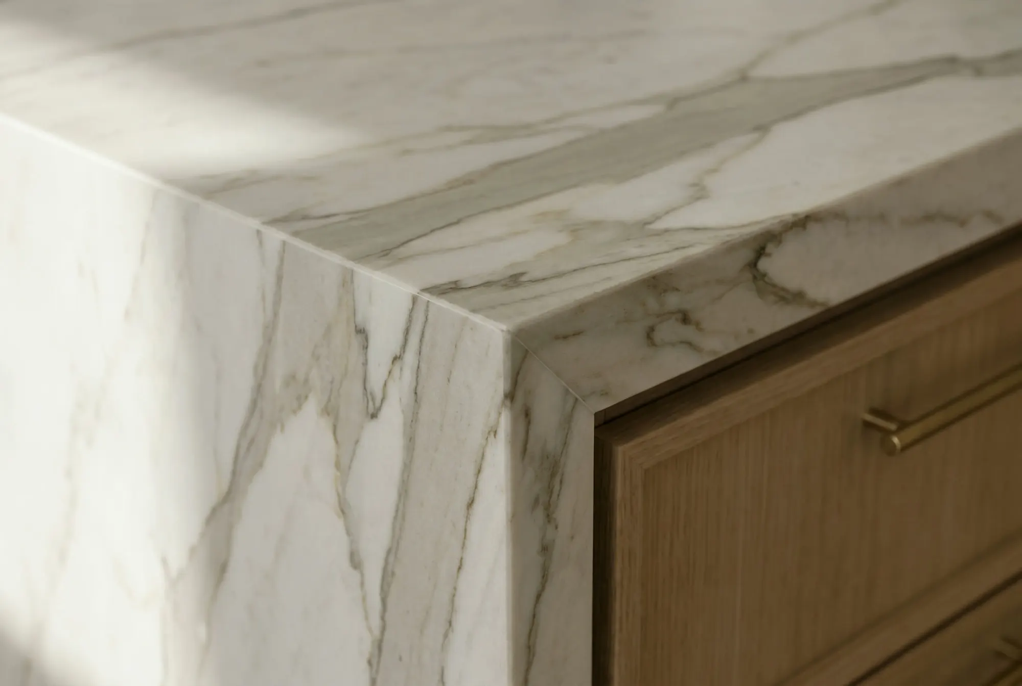 A mitered marble corner with the veining running continuously around the edge
