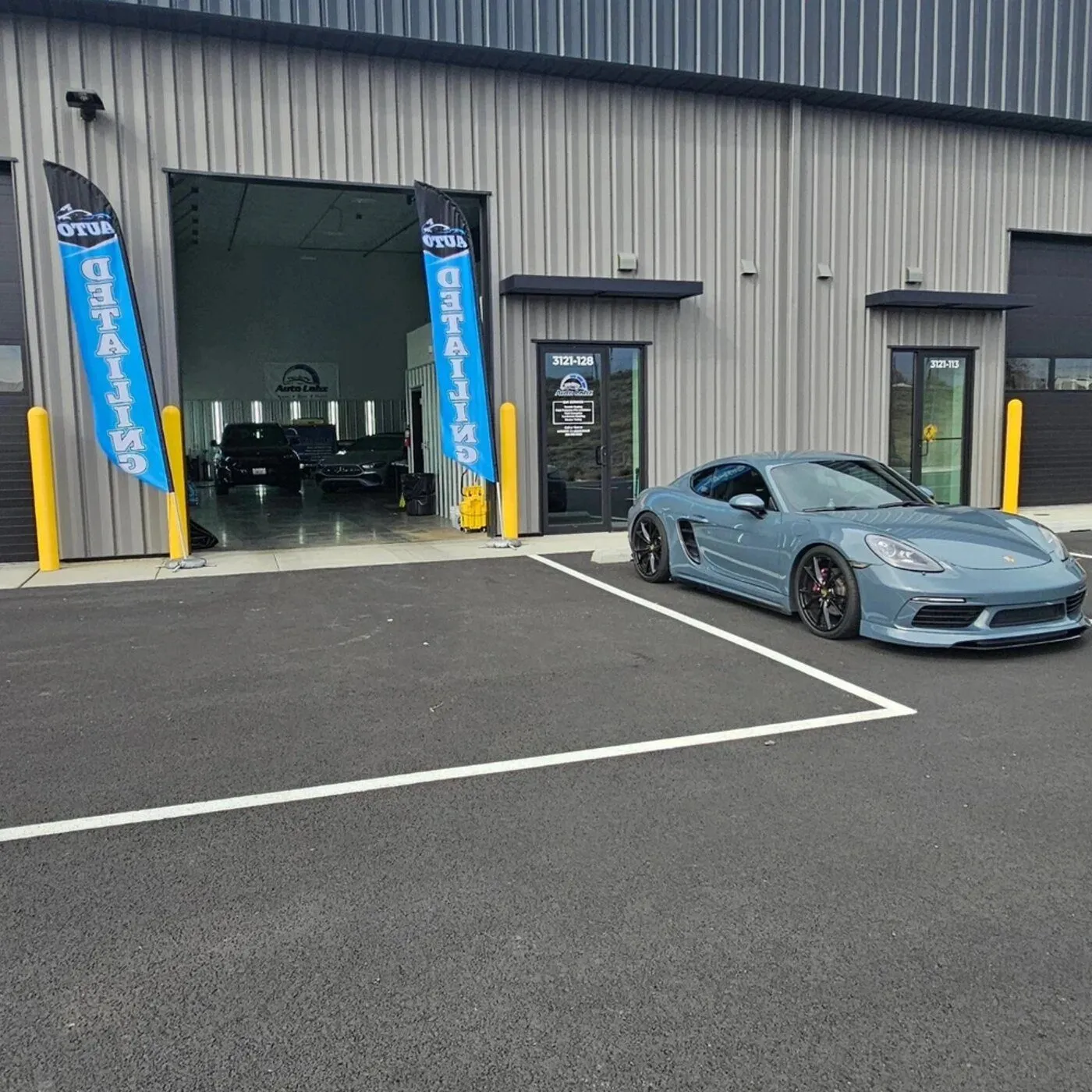 Tri City Auto Labz shop exterior in South Richland with a Porsche 718