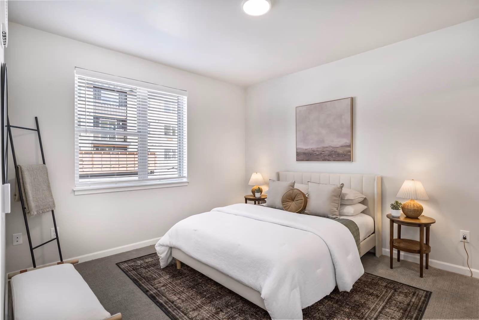 Cozy bedroom in a model home at The Veridian in Bend, Oregon
