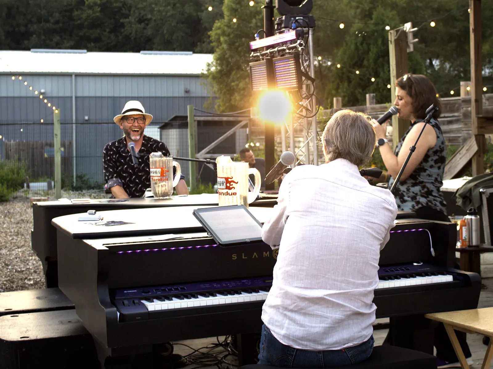 Piano Fondue performing an outdoor dueling pianos show in Wisconsin