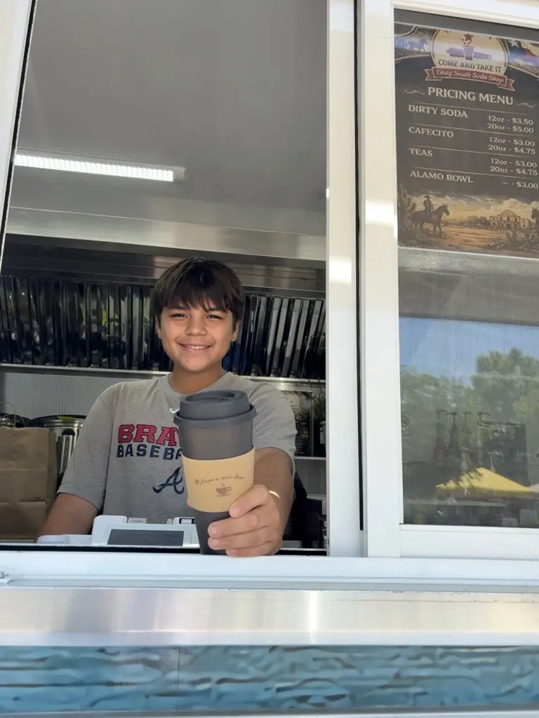 Matthias helping with the cashier window