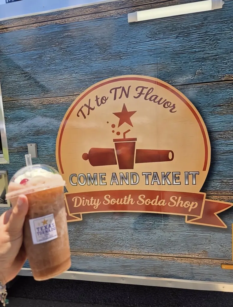 Guest holding a Texas Tornado dirty soda