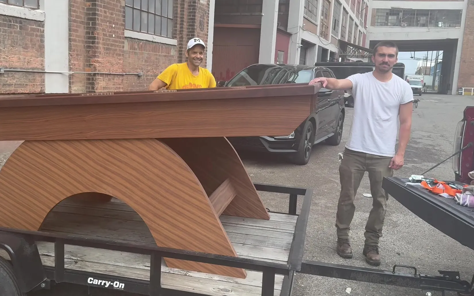Shane and Mike with the Vortex468 table loaded on a trailer