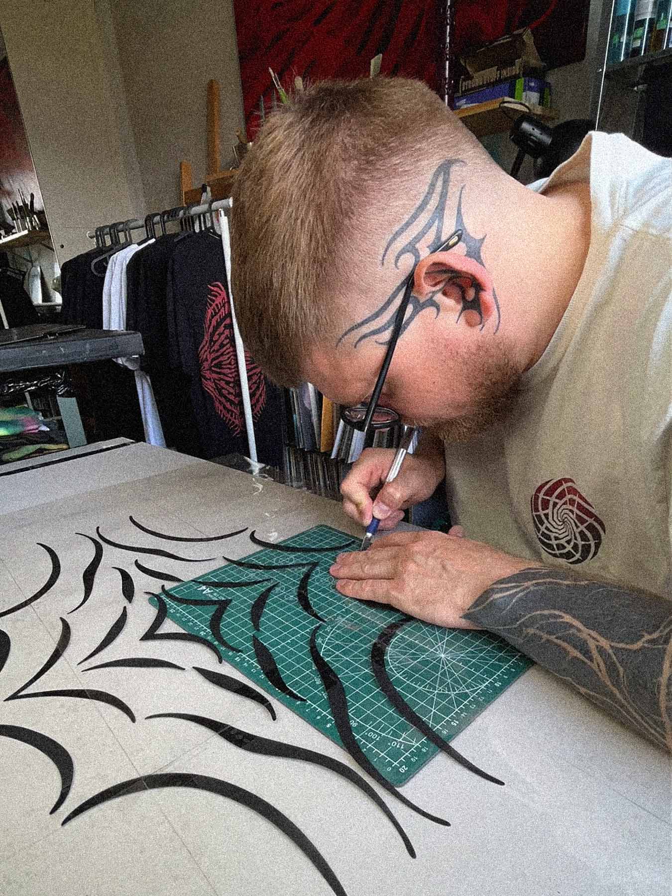 Hand-cutting the design | Mystic Bleach