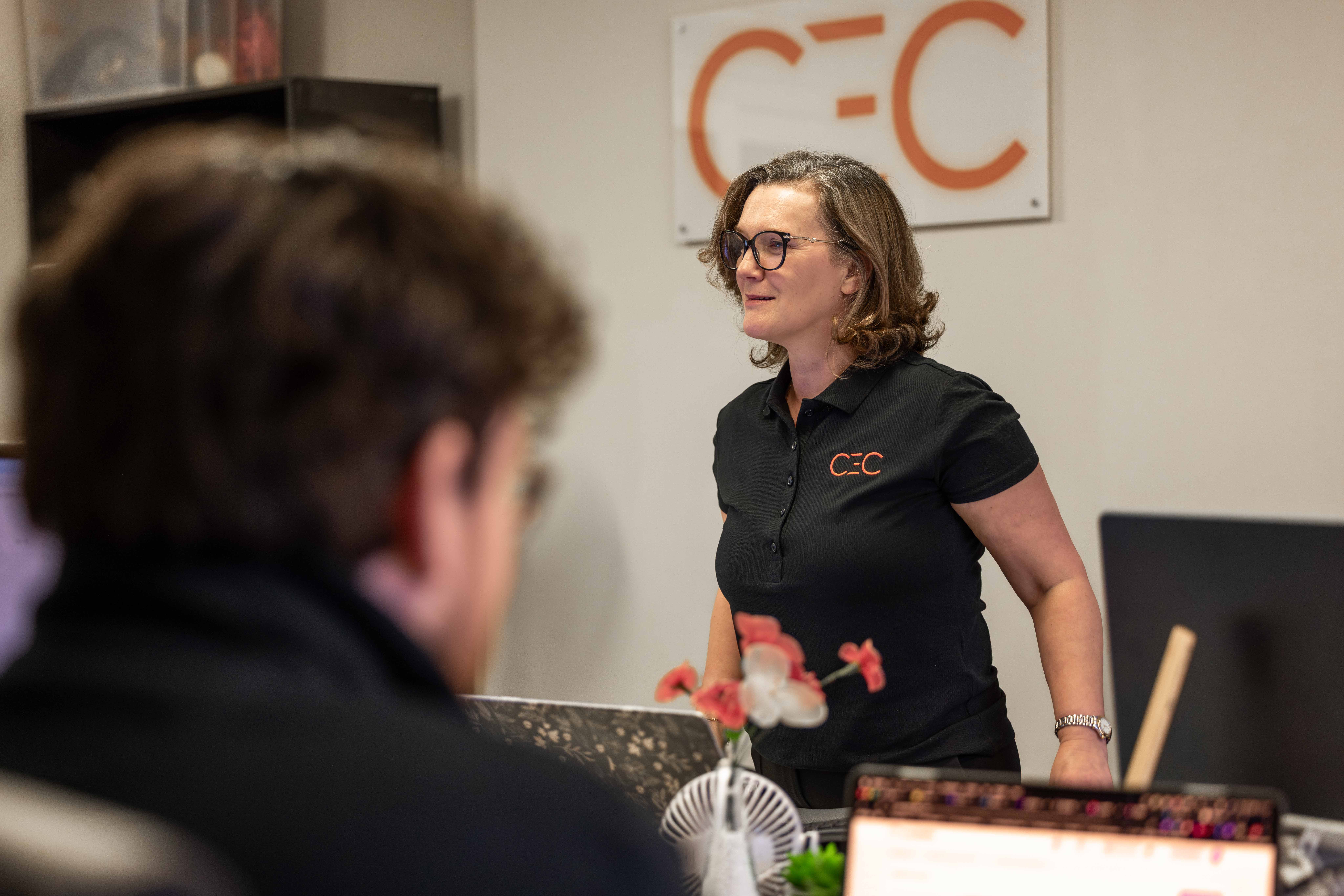 Commercial photography of a team member in an office setting