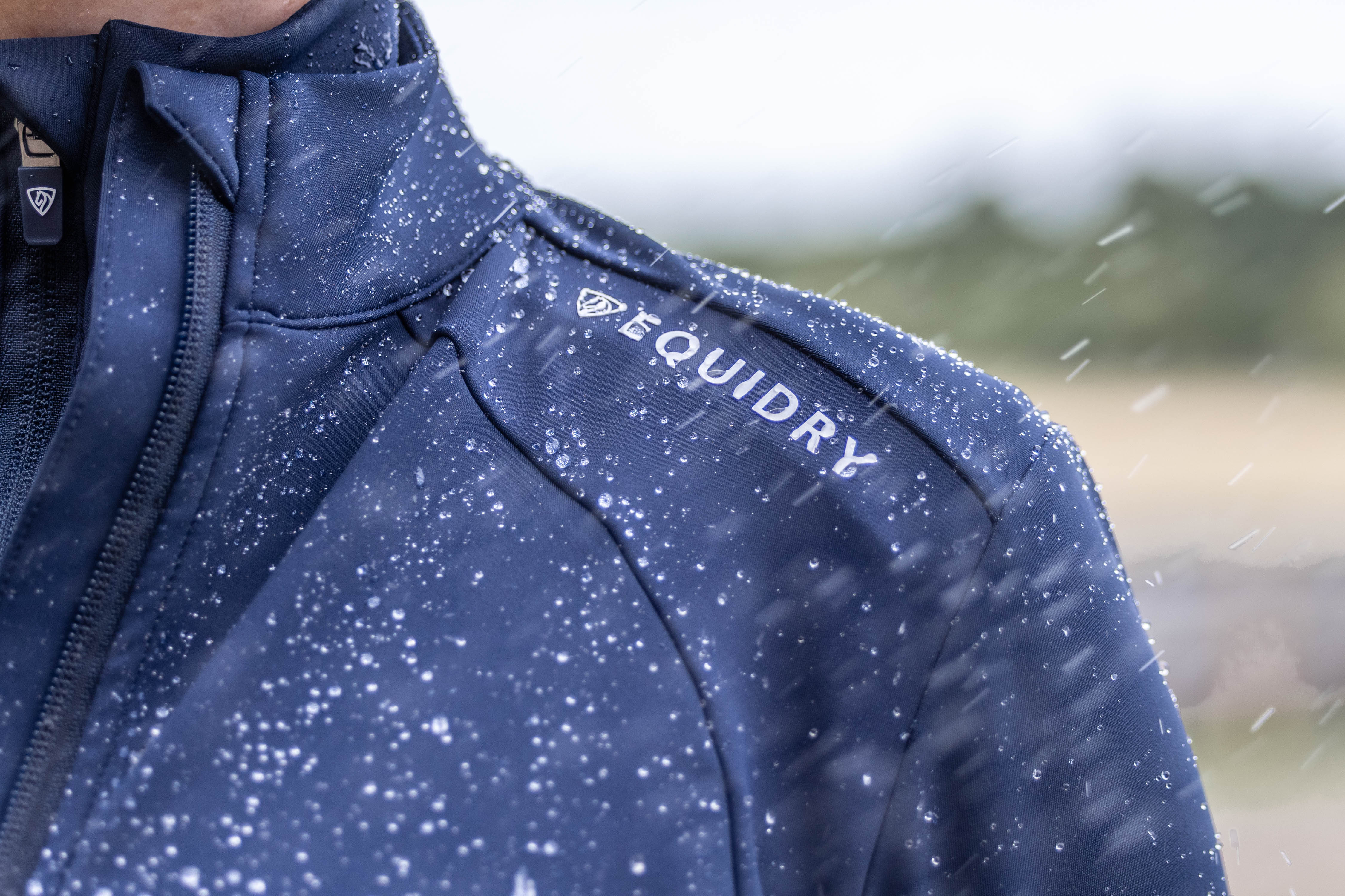 Equidry waterproof equestrian jacket photographed in the rain