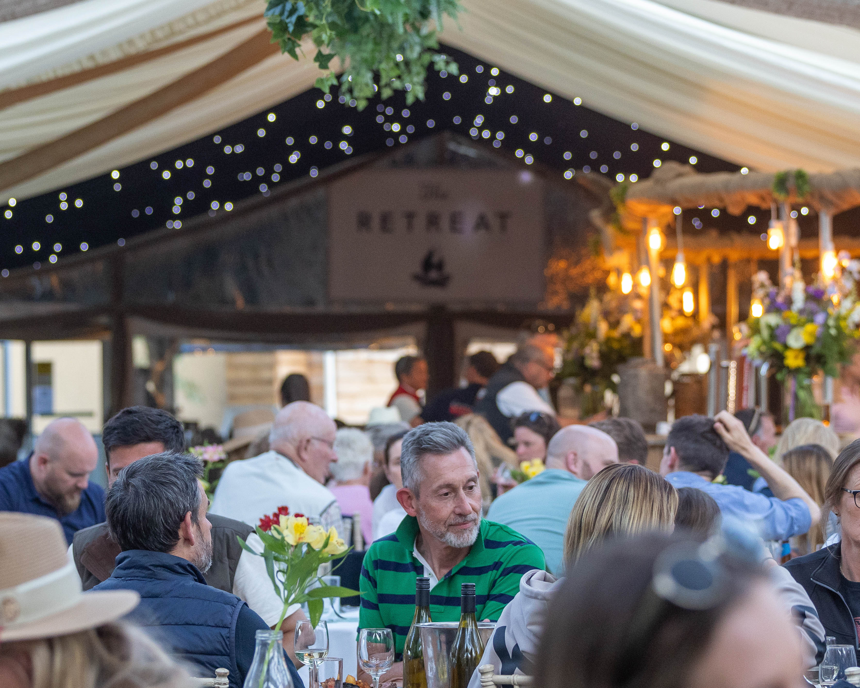 Guests dining at The Retreat event