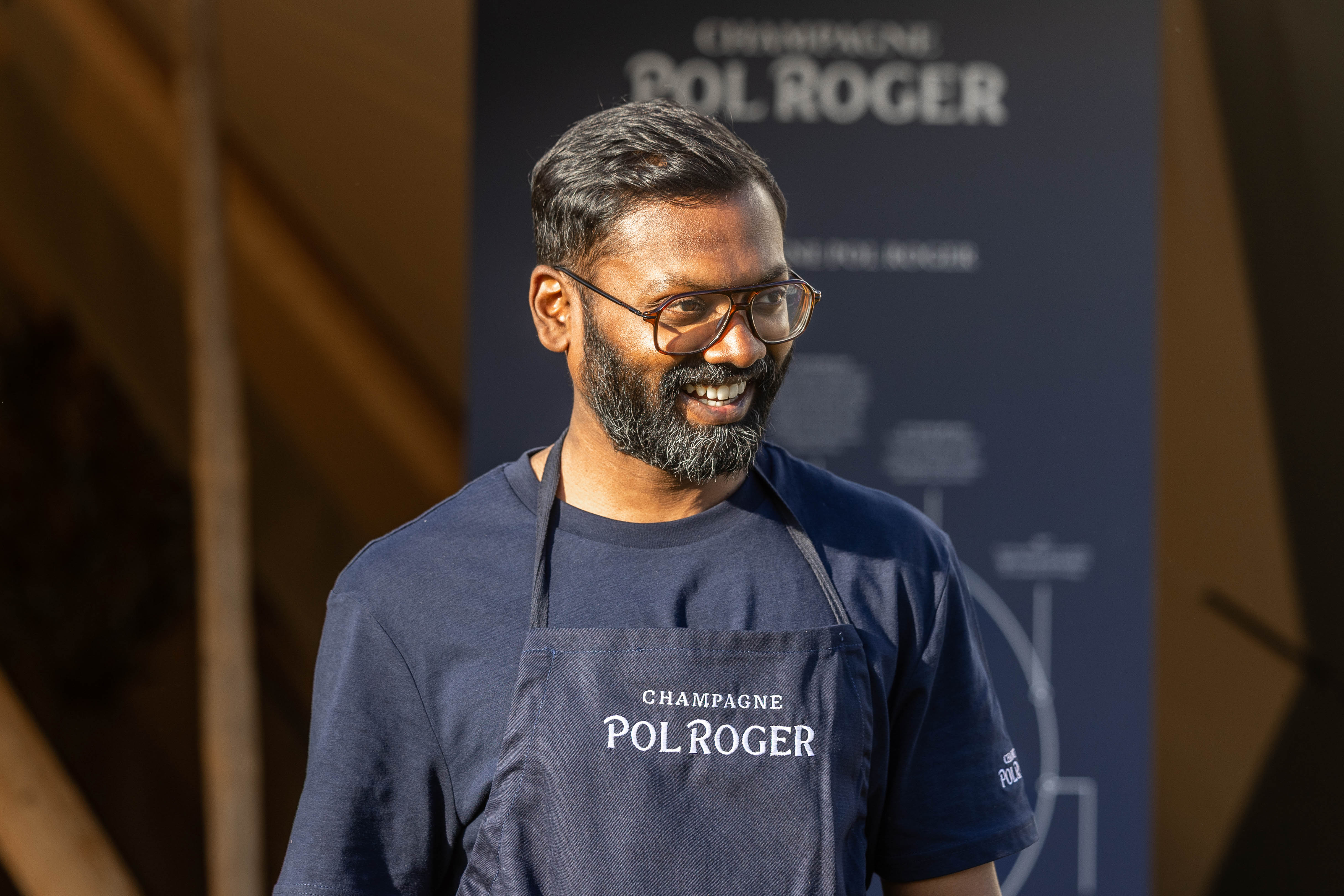 Pol Roger champagne team member at a brand event