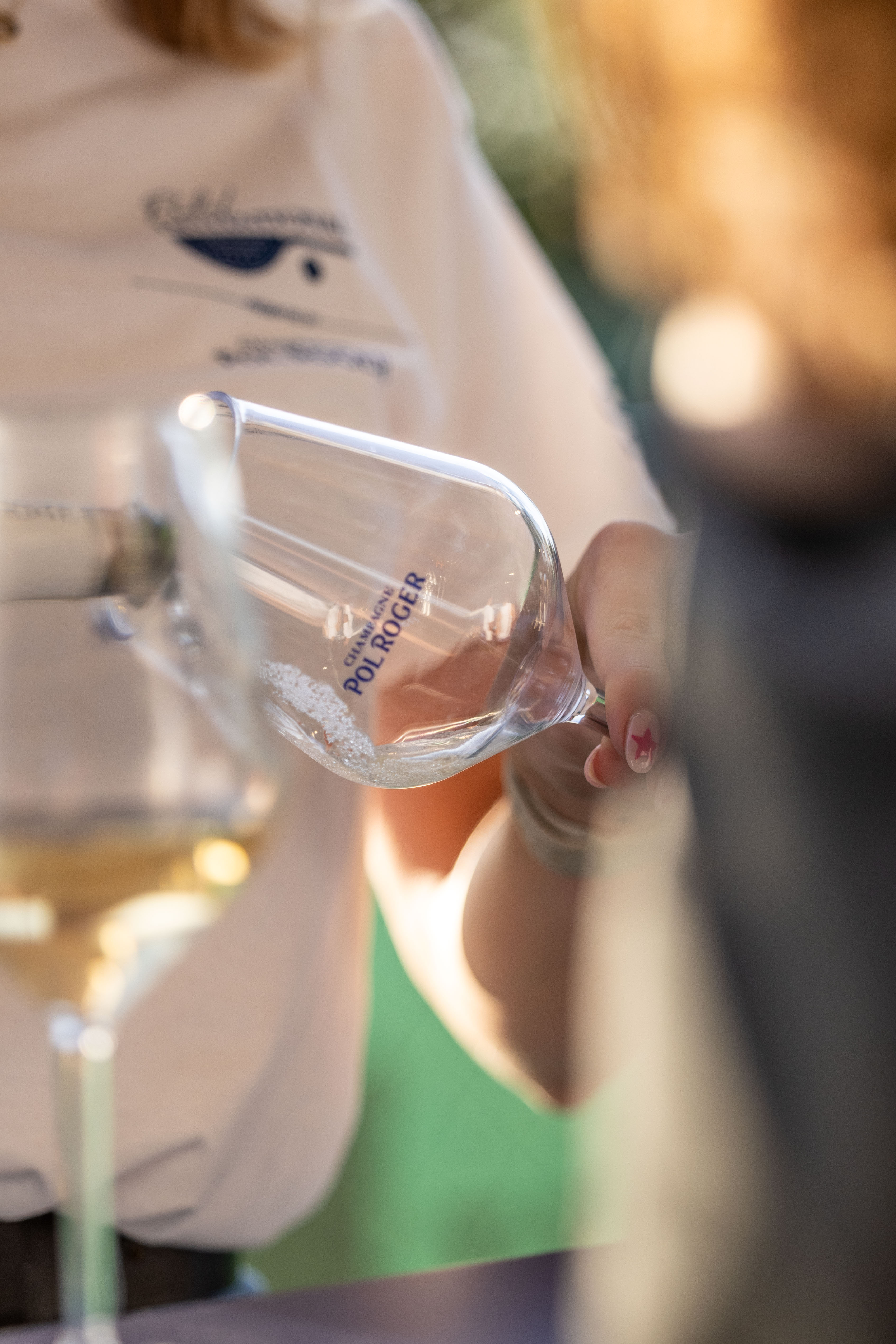Champagne being served at a padel event