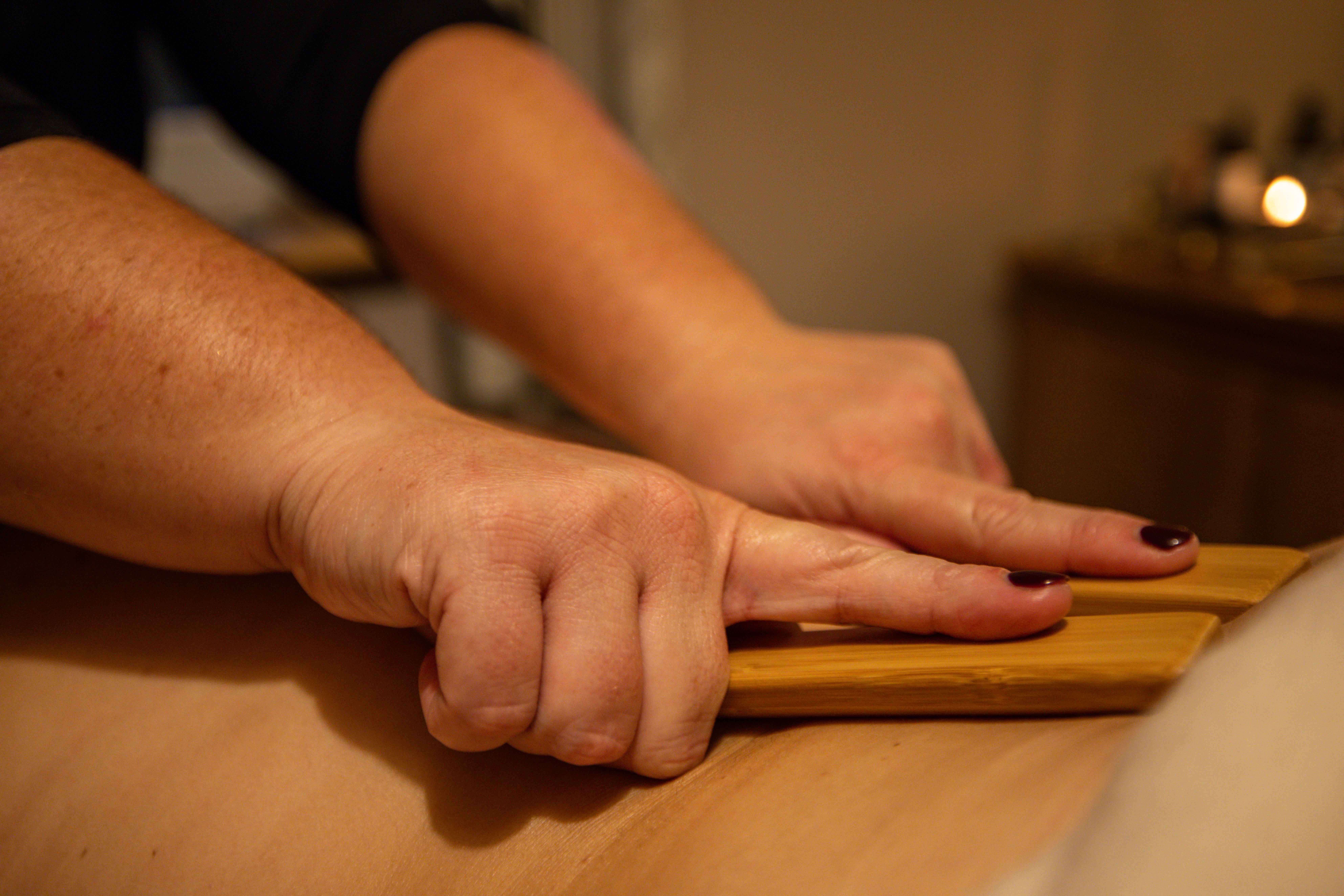 Bamboo massage treatment using bamboo massage tools