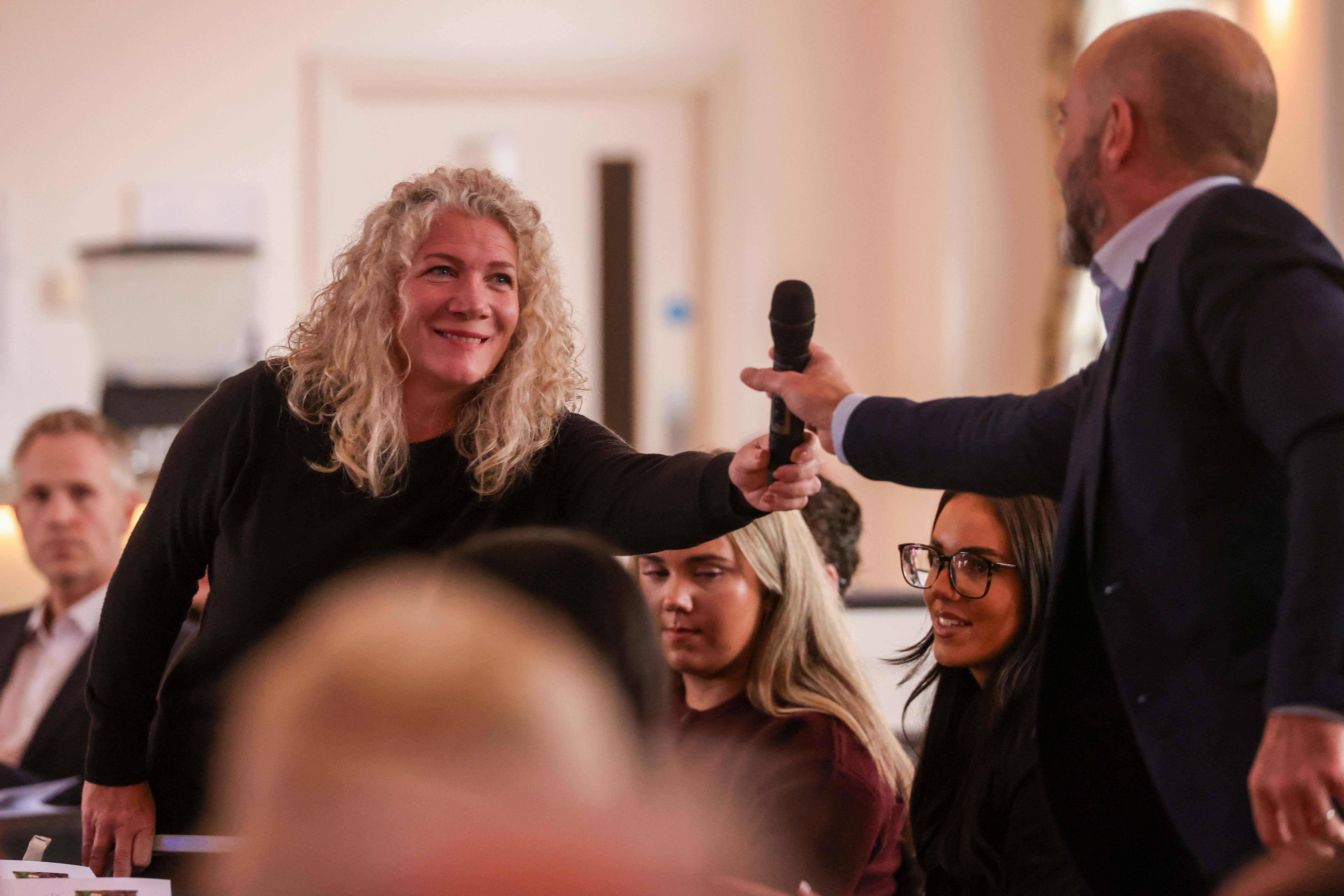 Guest being interviewed during a community charity event