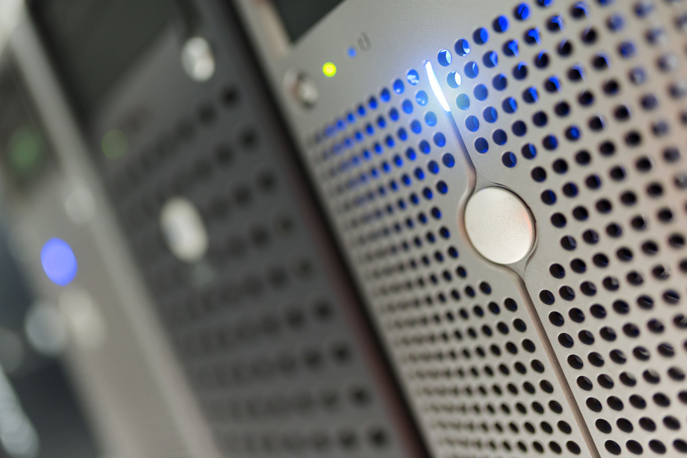 Close-up of server hardware with blue status lights