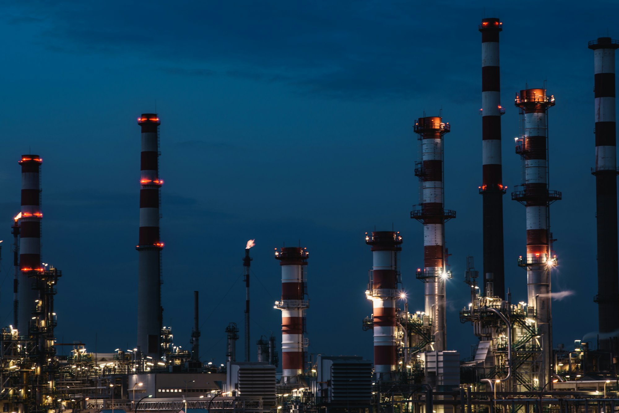 Chemical plant lit at dusk