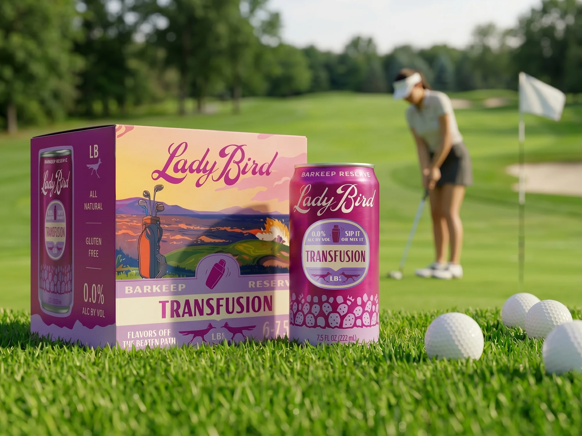 Can and six-pack box packaging for Lady Bird Barkeep Reserve Transfusion non-alcoholic cocktail, magenta and purple design with illustrated golf course sunset scene on box, displayed on golf course green with golf balls and golfer in background