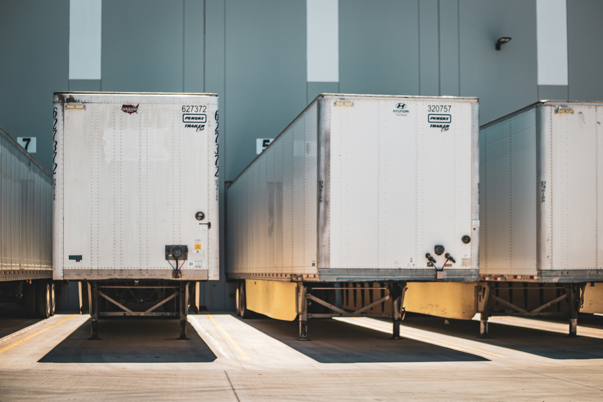 Freight trailers parked at warehouse loading bays.