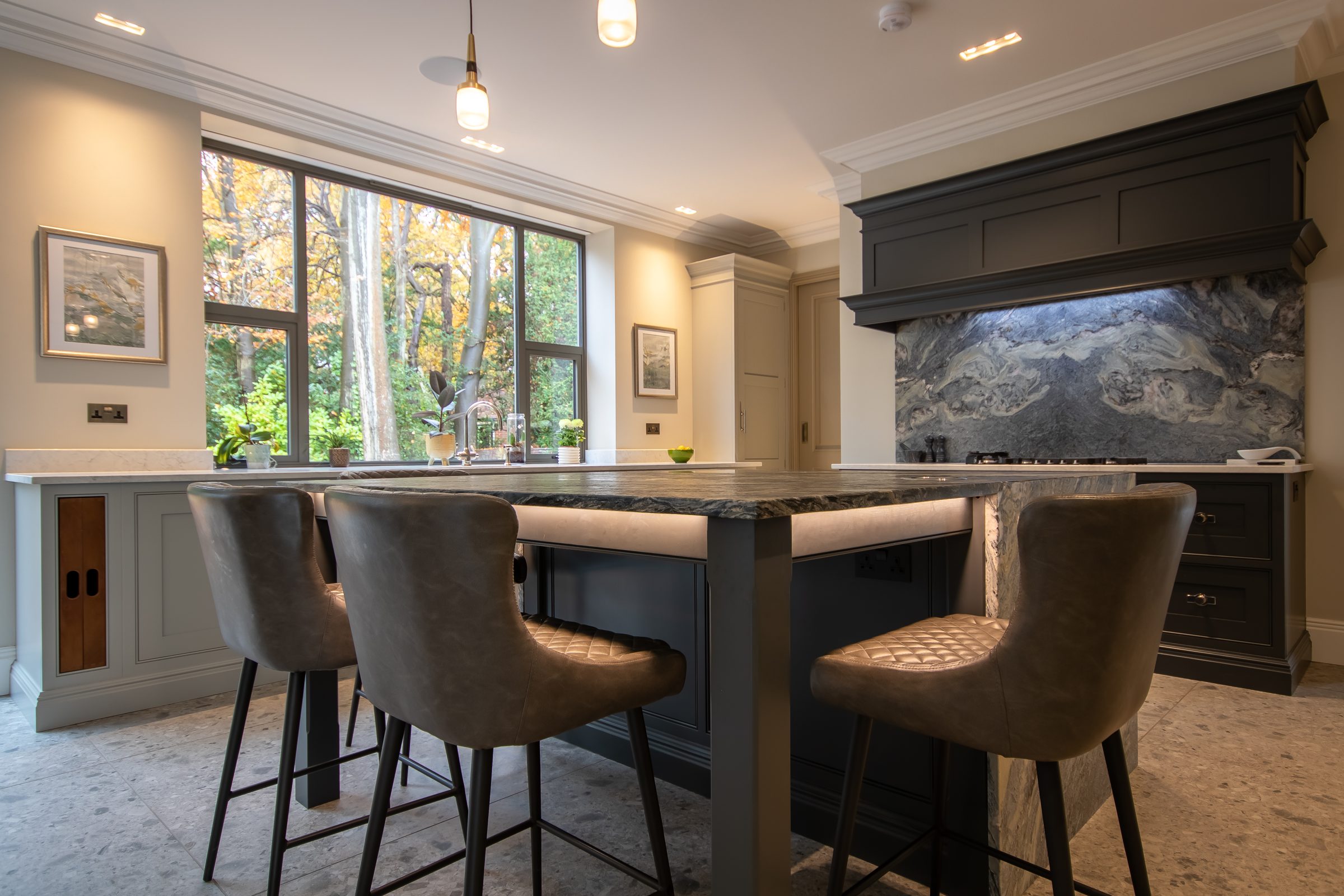 Langstone Manor kitchen island with stone waterfall worktop