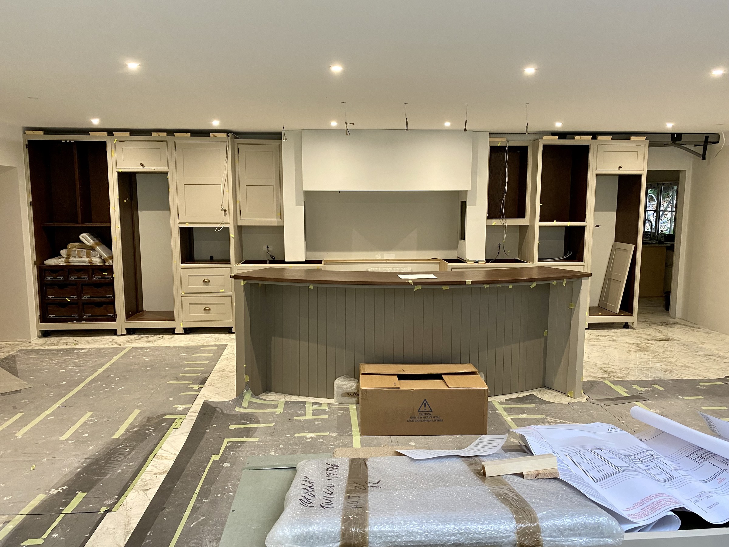 Hillside kitchen installation during the fit-out stage