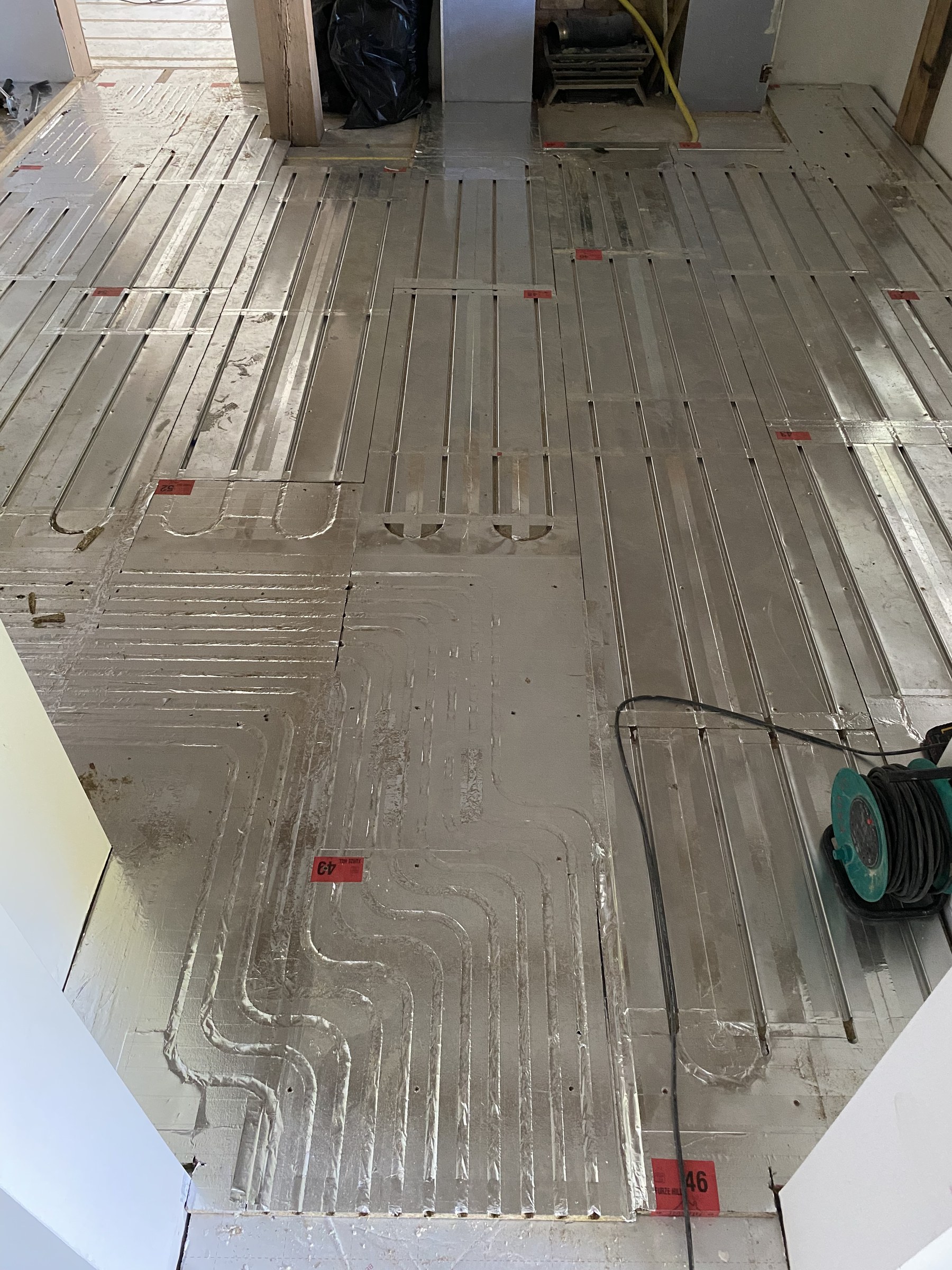Underfloor heating pipework during the Hillside services installation