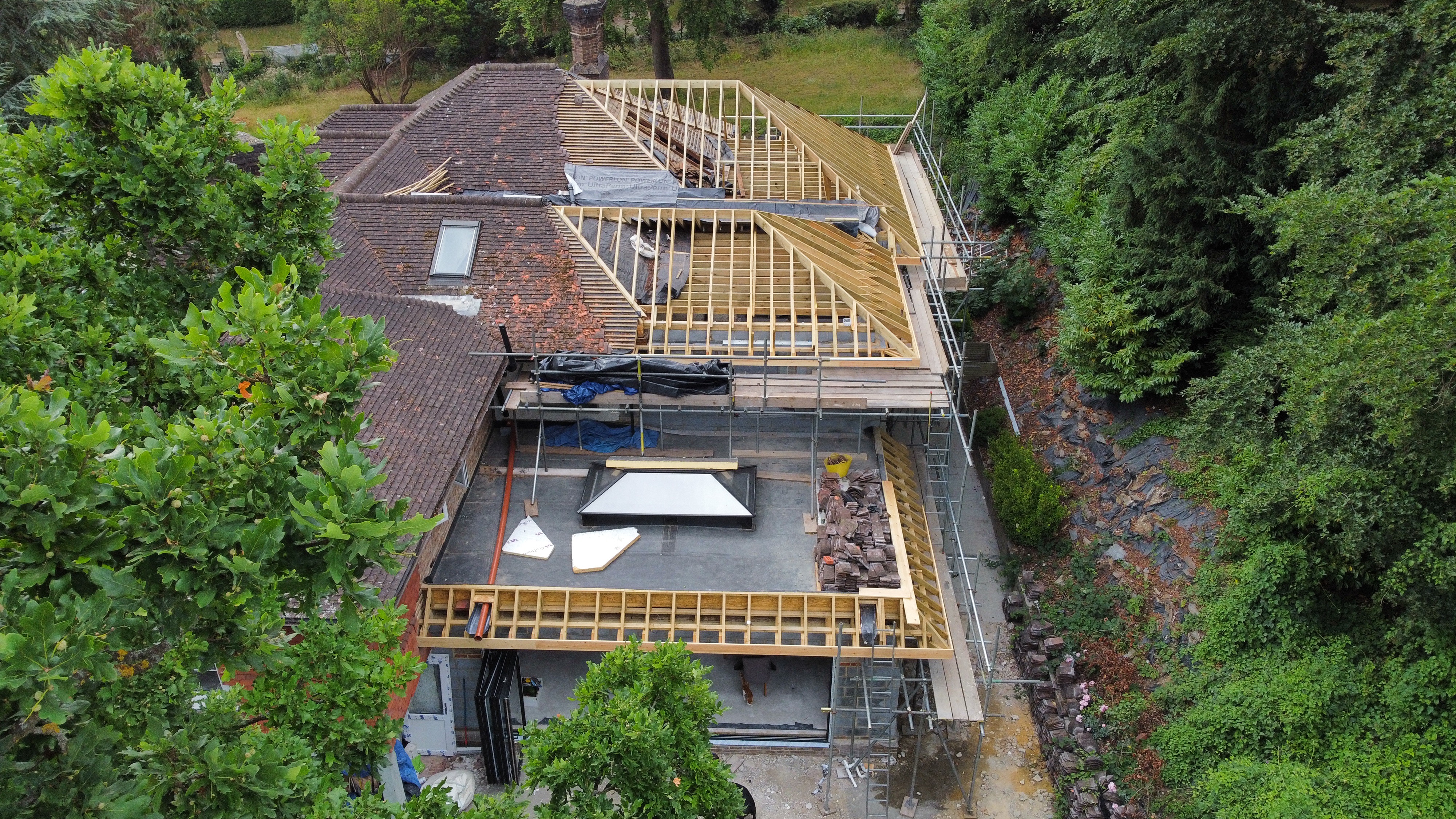 Hillside construction journey roof framing and extension works