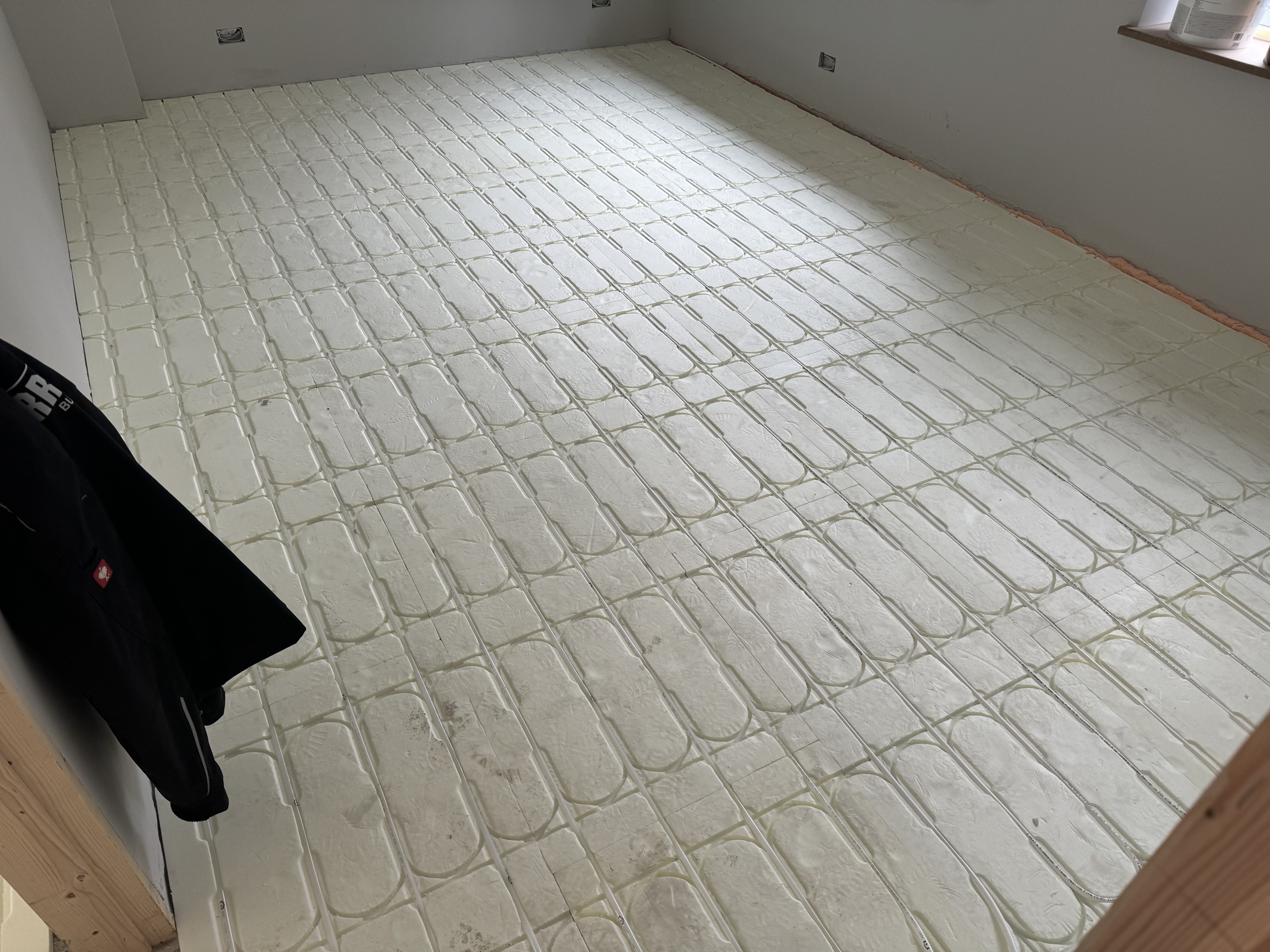 Underfloor heating installation at Surrey Peaks