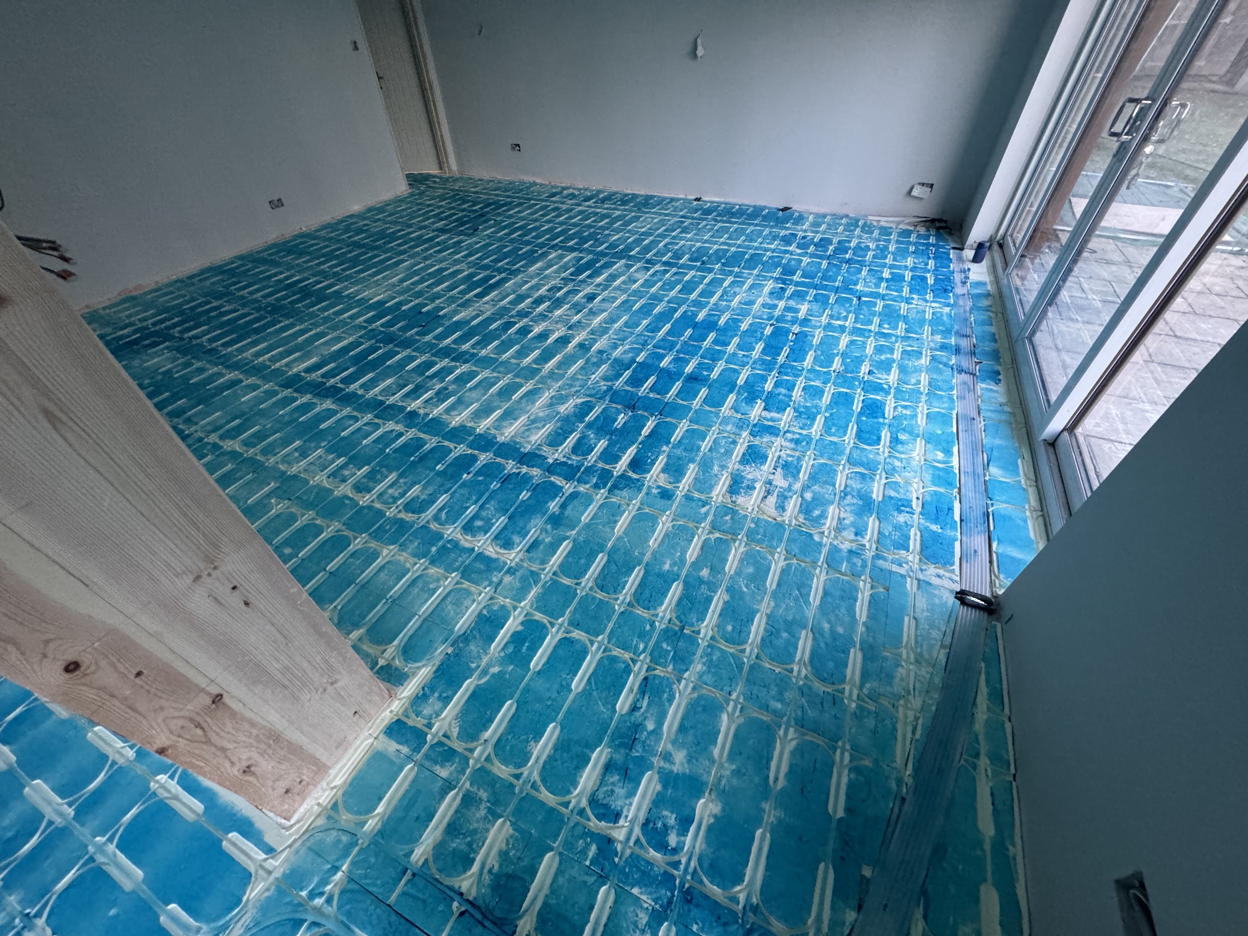 Underfloor heating pipework installed across the Surrey Peaks ground floor