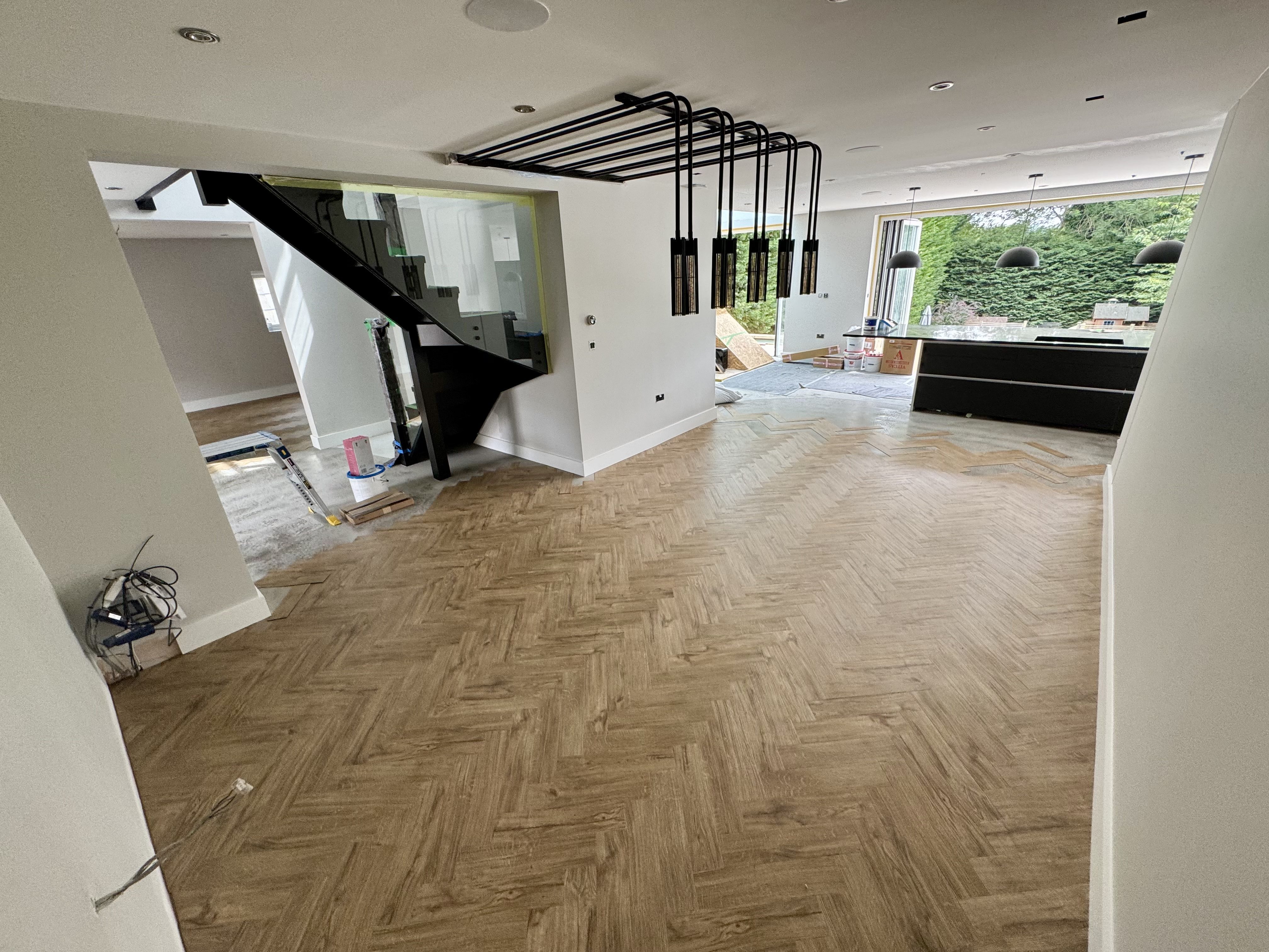 Parquet flooring installation during the Thornhill interior fit-out