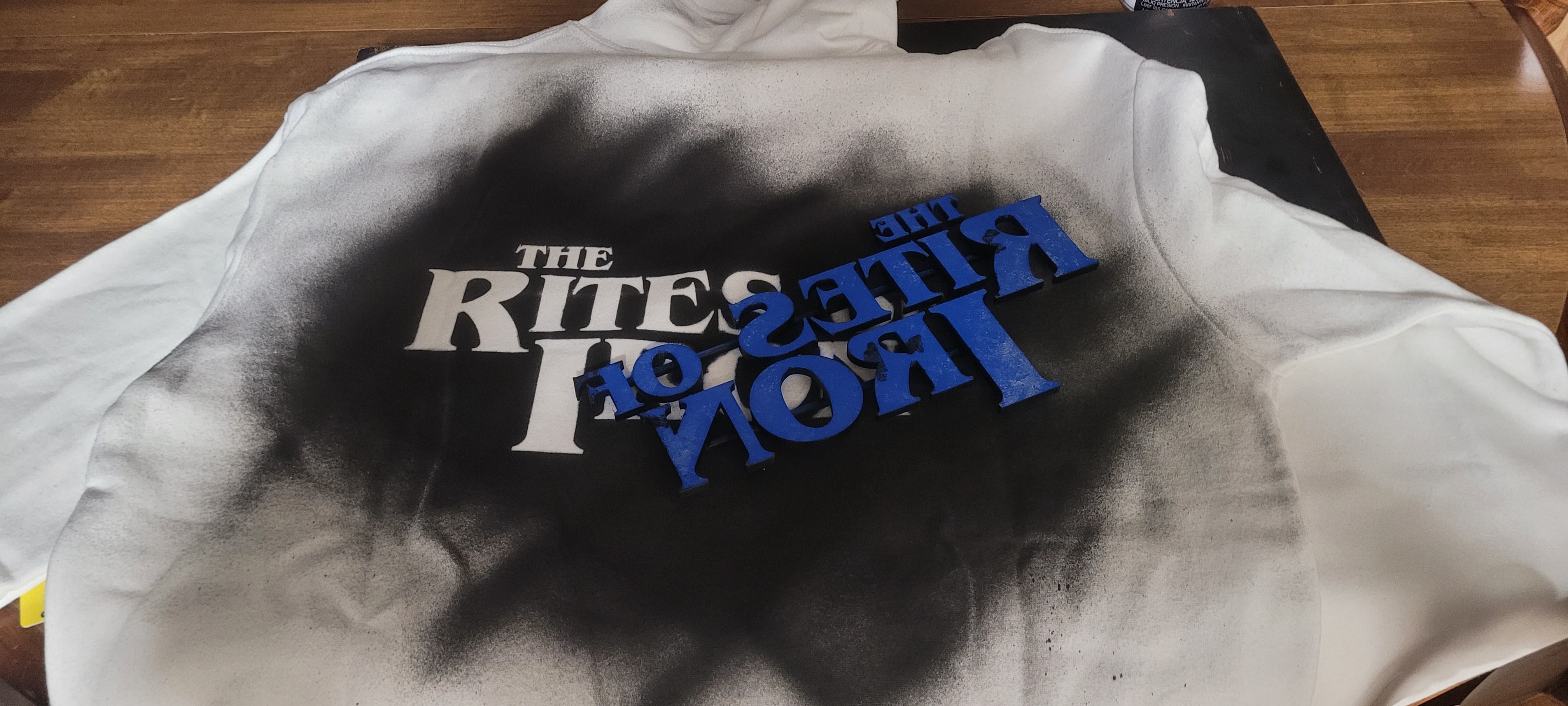 Hoodie with custom stenciled lettering