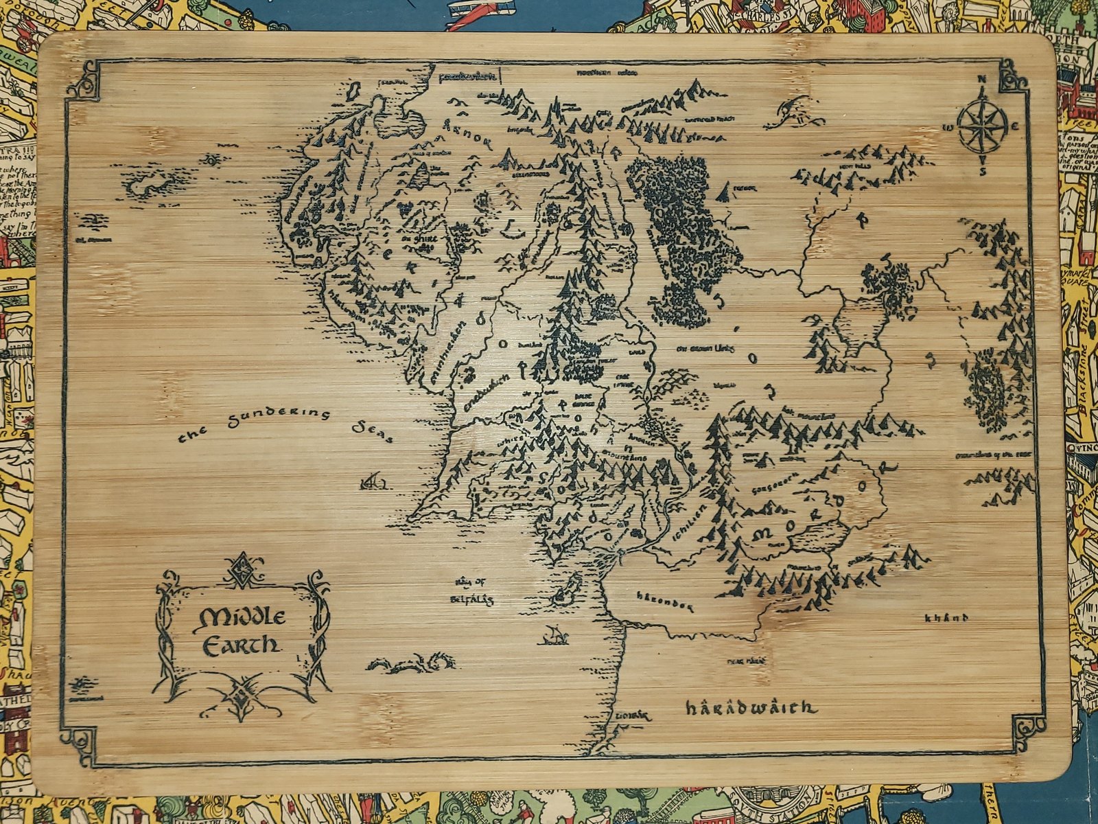 Bamboo cutting board laser-engraved with a detailed fantasy map