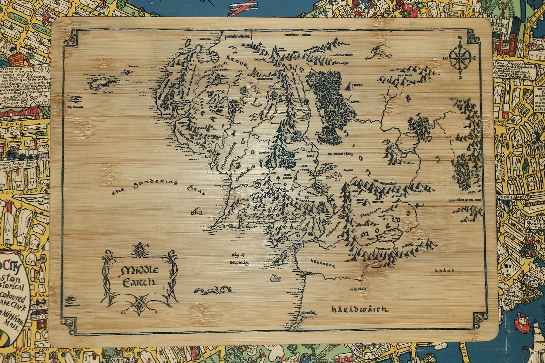Bamboo cutting board laser-engraved with a detailed fantasy map