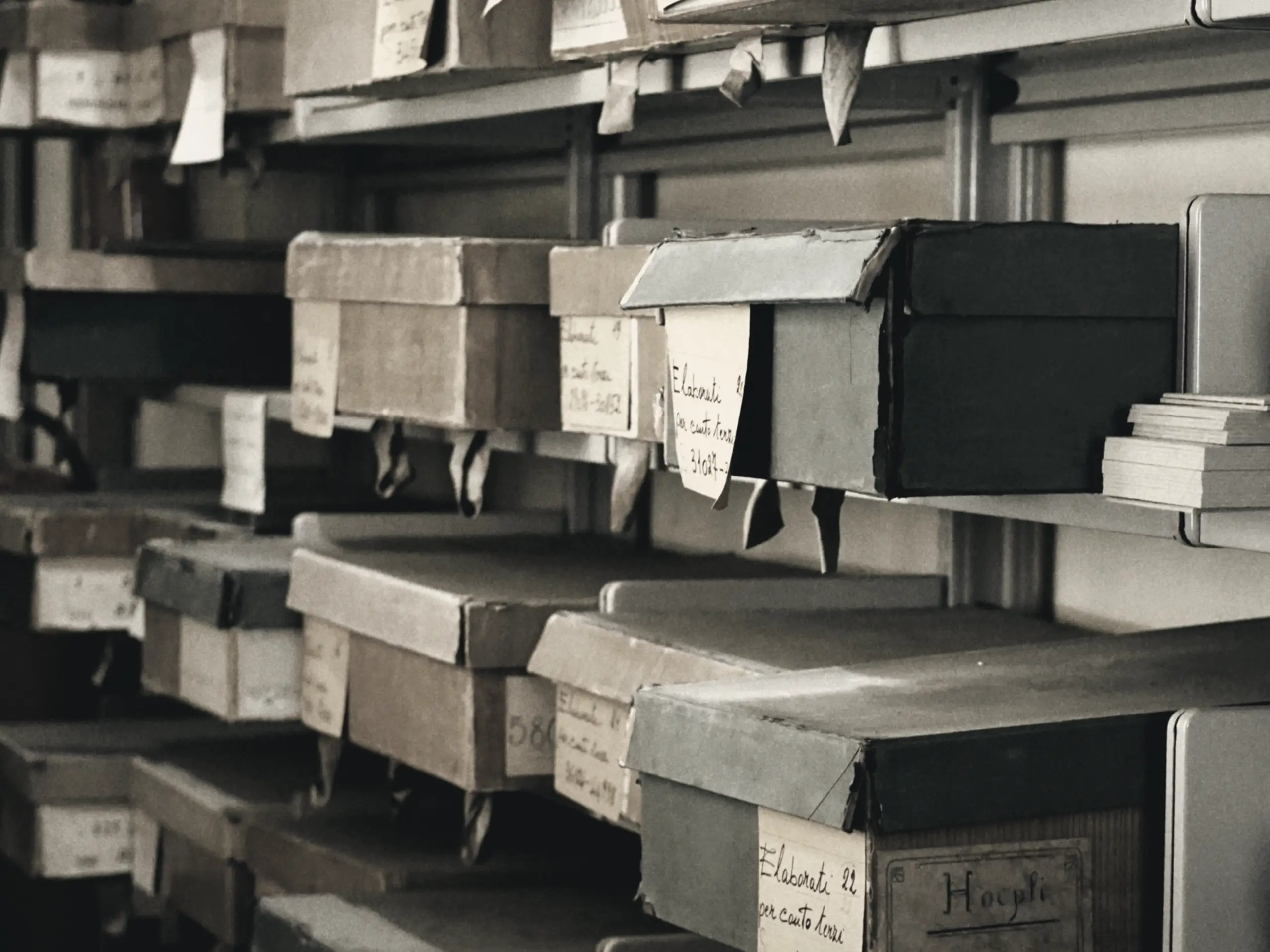 Labelled archive boxes on steel shelving