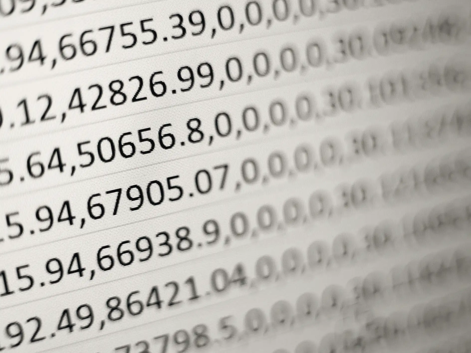 Rows of printed figures on a ledger sheet, seen at an angle