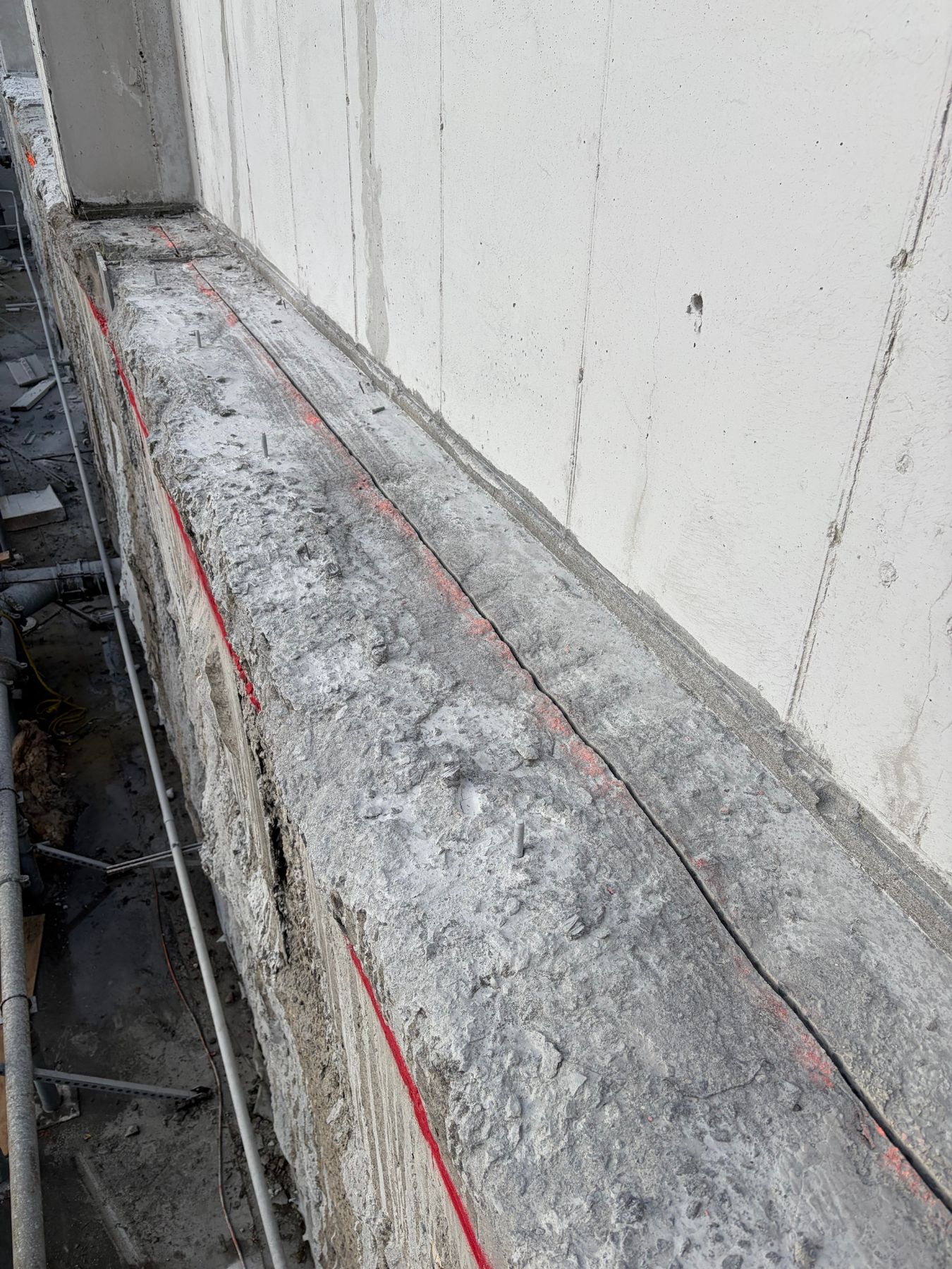 Clean saw cut through a reinforced concrete wall