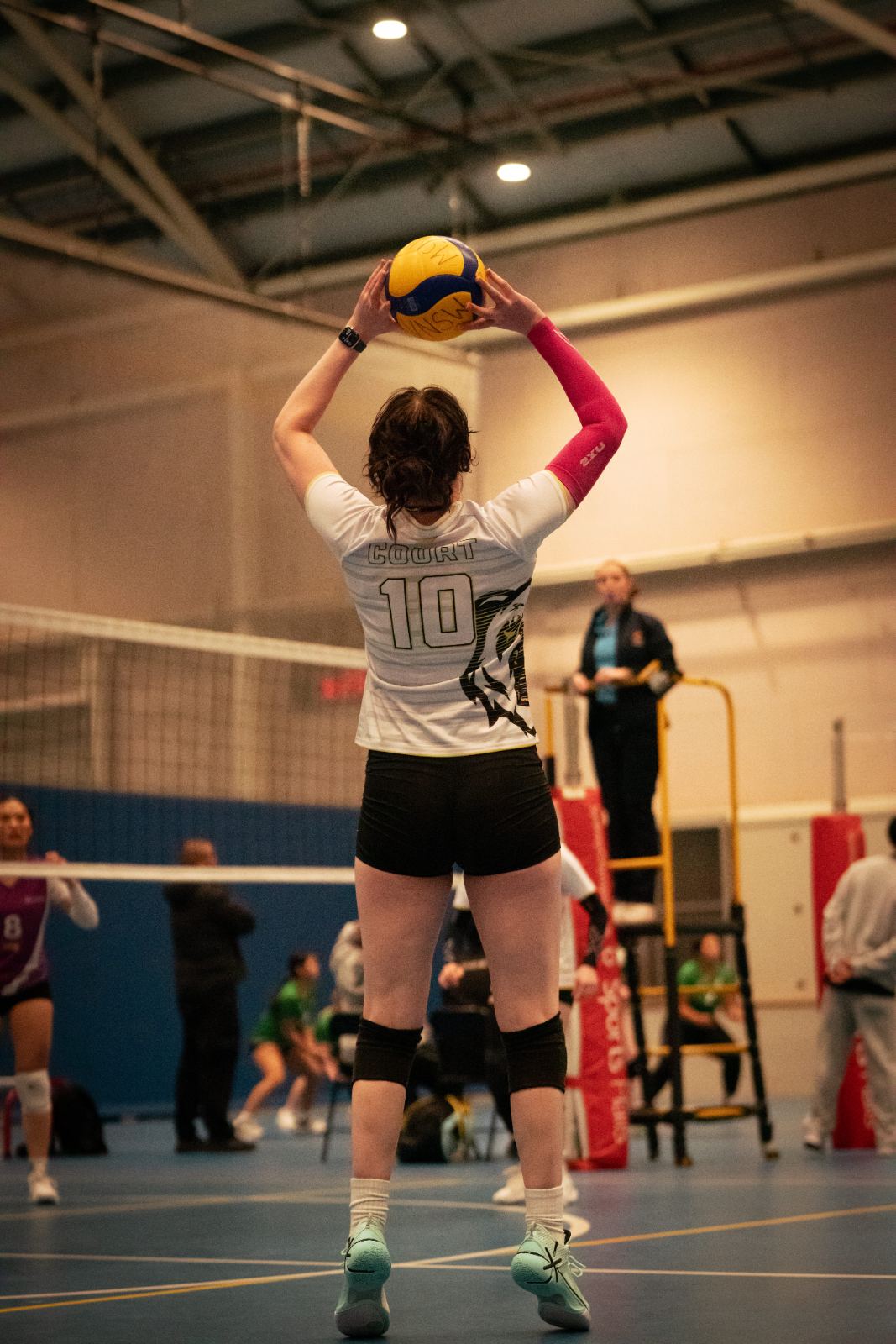 A player jump serving during social games