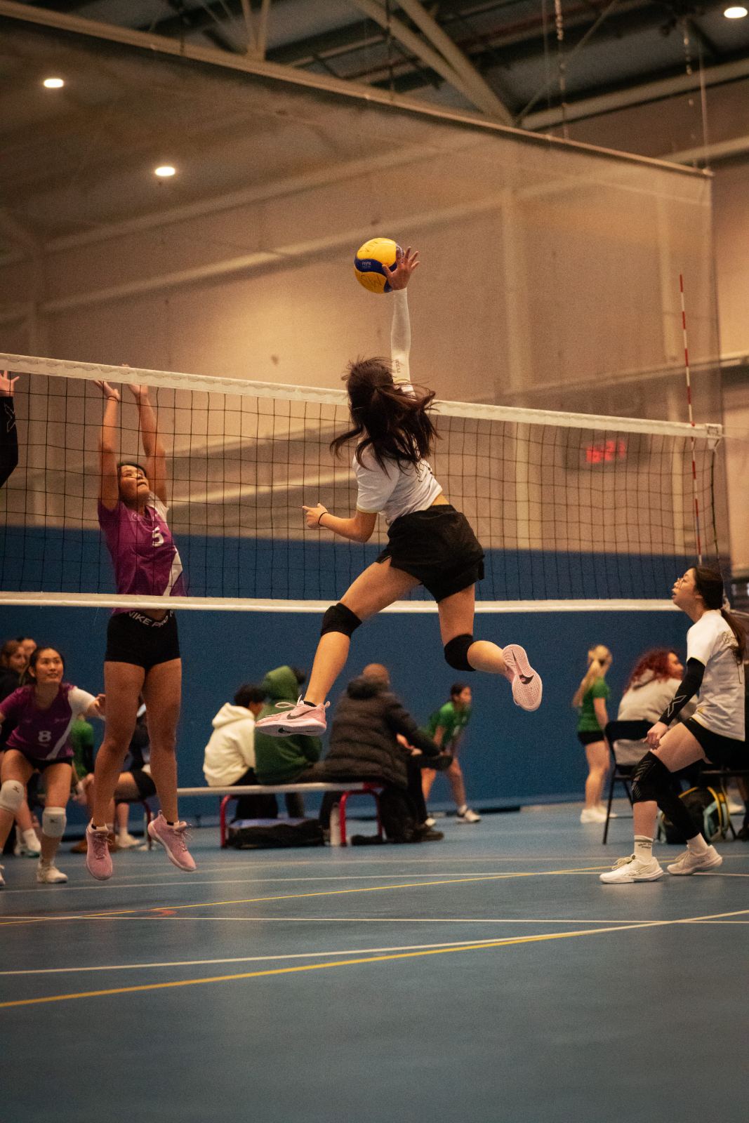 A Bossley Bears player attacking over the block