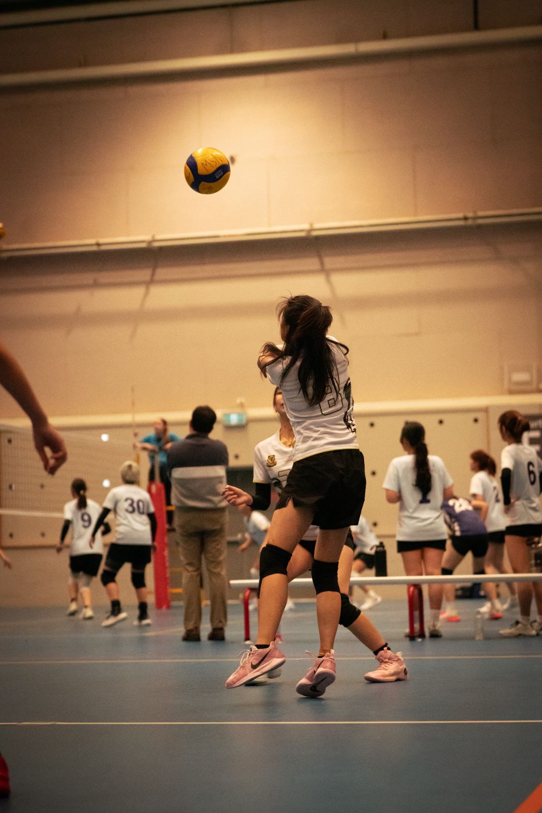 A teen player serving during a Bossley Bears session
