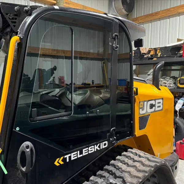 JCB Teleskid — full cab tint installed by Elite Window Tinting, Navarre FL