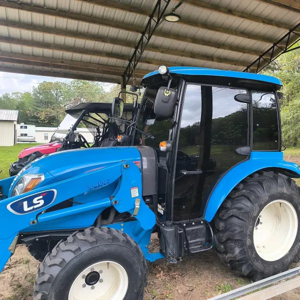 LS Tractor Cab — full cab installed by Elite Window Tinting, Santa Rosa Co.