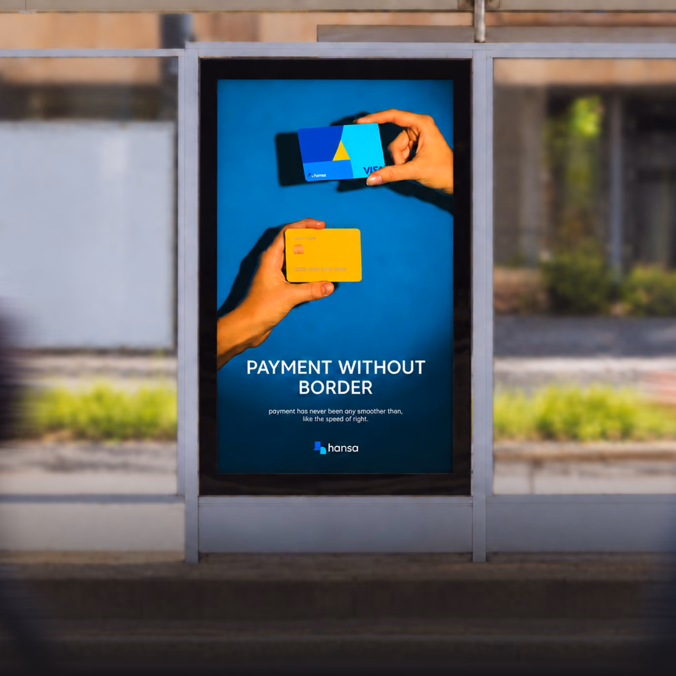 Bus shelter ad reading 'Payment without border' with hands holding payment cards