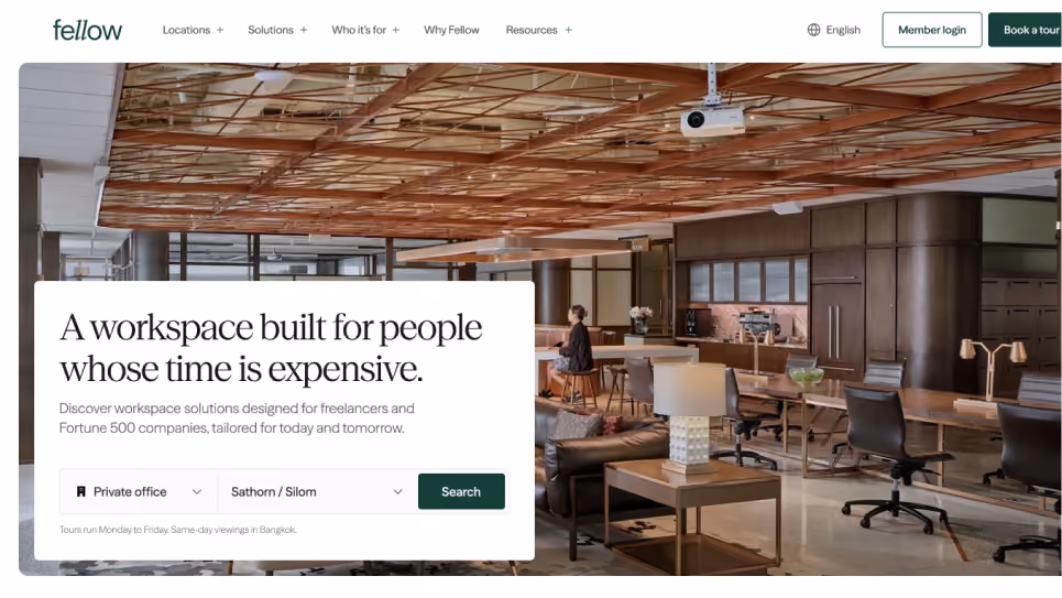 Fellow workspace site hero with a lounge and offices, headline 'A workspace built for people whose time is expensive'